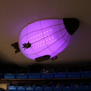 Die Zeppelin-Lampe hängt :) Da ich kleben musste (die Stahlbeton-Decke war hartnäckiger als gedacht) hat das alles deutlich länger gedauert, aber mit dem Ergebnis bin ich sehr zufrieden. Die Beleuchtung kann via Fernbedienung gesteuert werden, der Infrarot-Empfänger ist in der Gondel des Zeppelins verbaut. War ein schönes Projekt und hat echt Spaß gemacht... auch wenn ich mir mehr als einmal die Finger zusammengeklebt habe :P
The Zeppelin lamp is ready :) Because I had to glue (the reinforced concrete ceiling was more stubborn than I thought) it took a lot longer, but I am very satisfied with the result. The lighting can be controlled by remote control, the infrared receiver is built into the gondola of the Zeppelin. It was a nice project and was really fun... even though I glued my fingers together more than once :P
#werkstatt #workshop #maker #lightning #electronics #propmaking #arduino #rgb #rgblights #makerspace #makersgonnamake #werkstattliebe #mancave #engineering #handmade #soldering #kellerwerkstatt #diy #hackspace #basteln